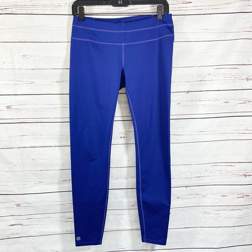 Athleta Women’s Leggings Blue With Back Zipper Size M.